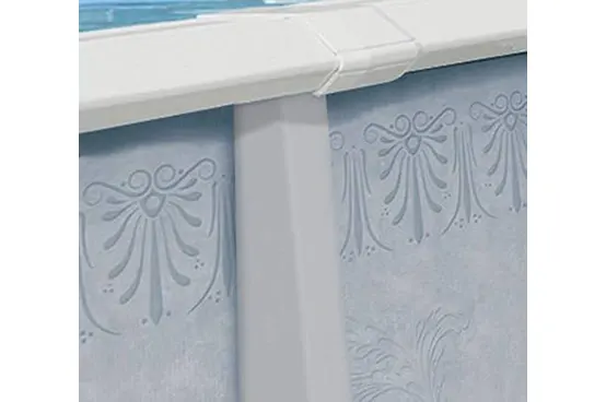 Above-ground pool wall liner detail showing decorative pattern and white coping trim