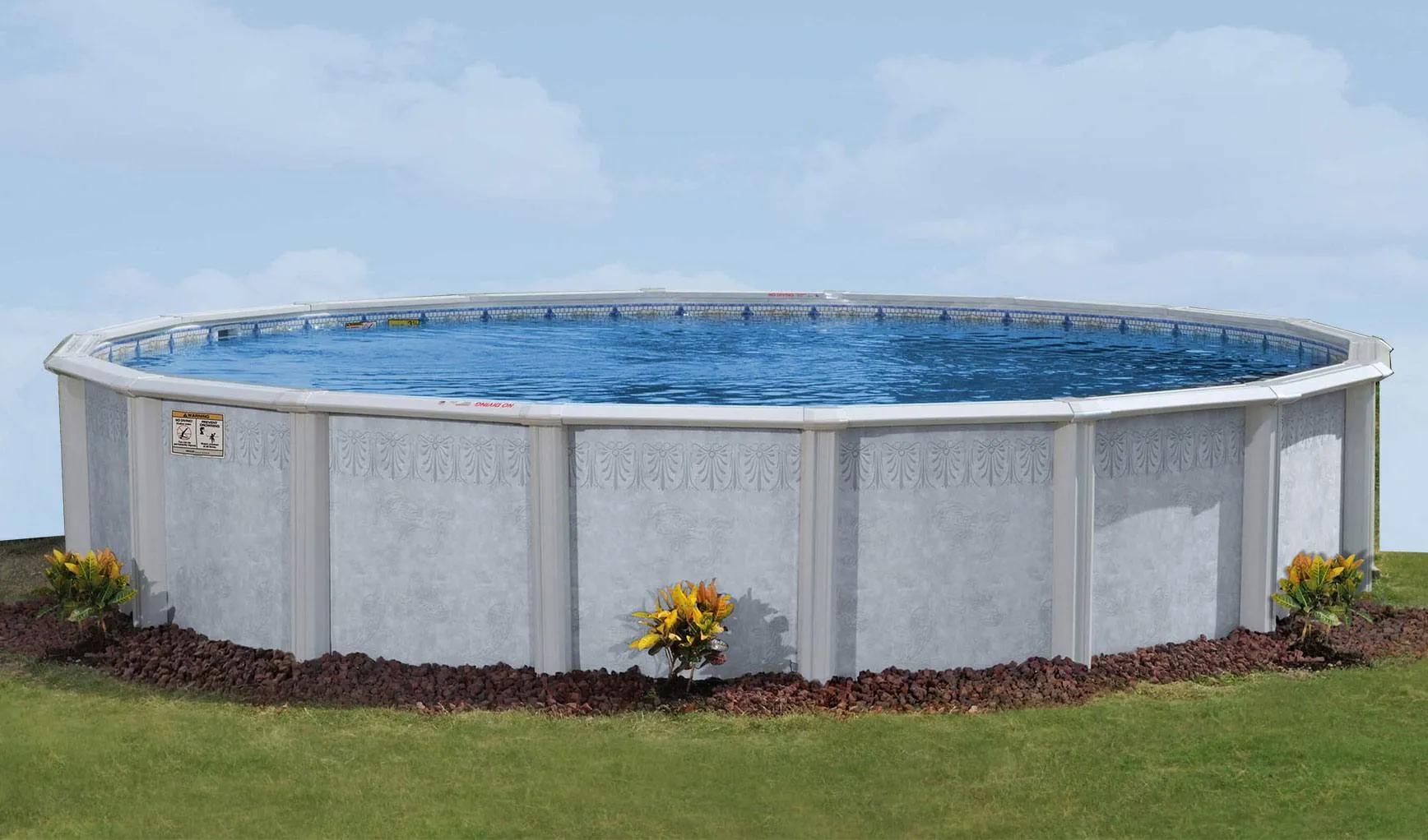 Large oval above-ground pool with white walls filled with crystal blue water