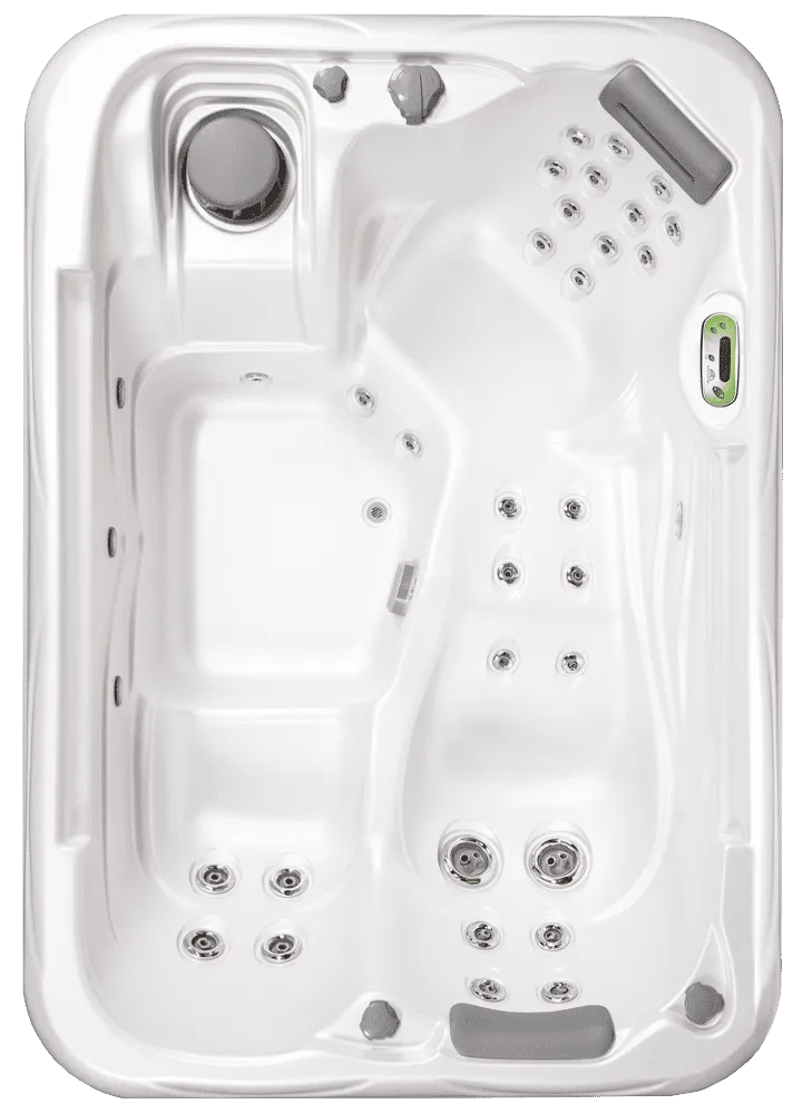 Top-down view of white hot tub spa equipment with jet controls and digital panel