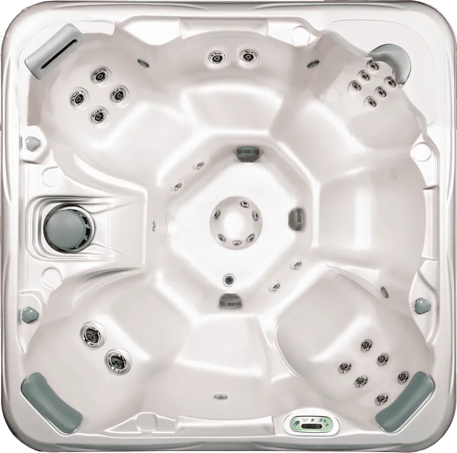 Overhead view of white hot tub interior with jets and spa equipment installed