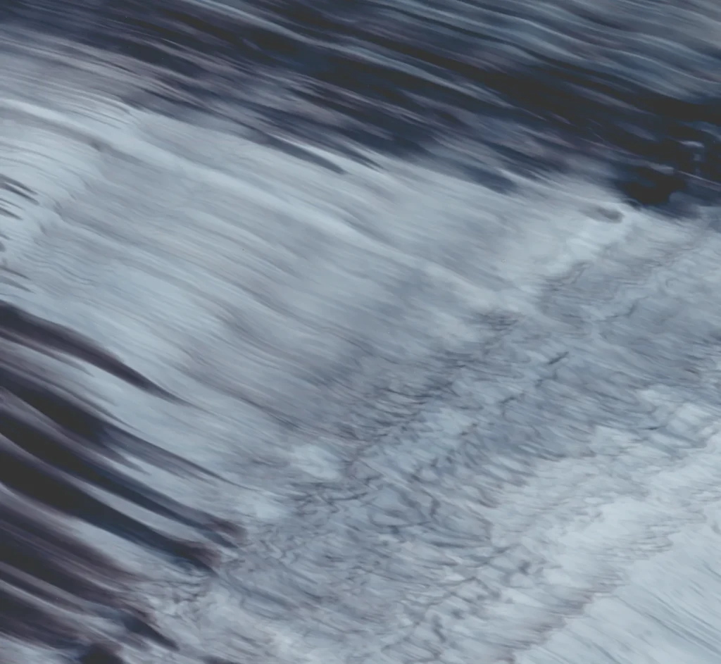 Close-up of sparkling water waves in swimming pool or hot tub