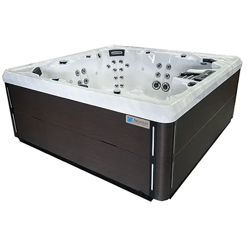 Luxurious hot tub with white acrylic shell and dark cabinet base featuring spa equipment jets